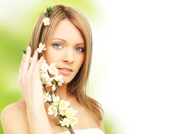 Beautiful woman with spring blossom — Stock Photo, Image