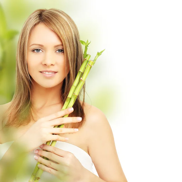 Spa woman with bamboo. Clear fresh skin Royalty Free Stock Images
