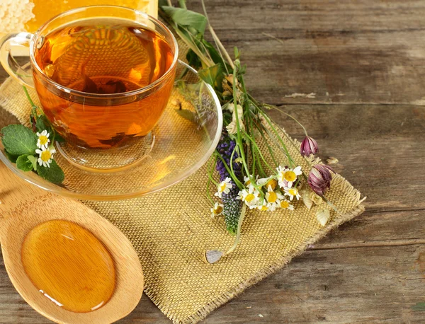 Chá e mel em segundo plano - conceito de comida orgânica Imagens Royalty-Free