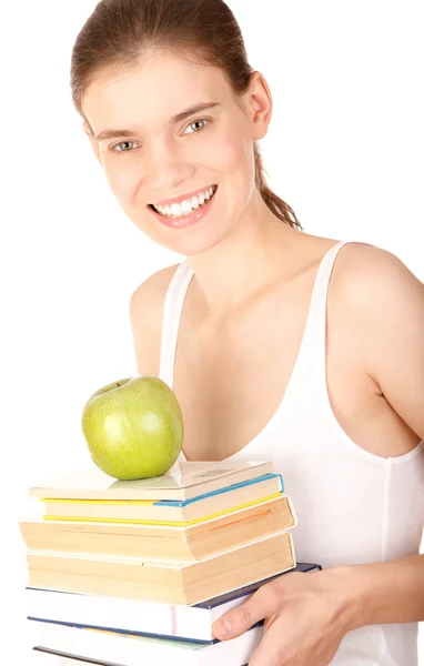 Chica bonita con libros y manzana verde —  Fotos de Stock