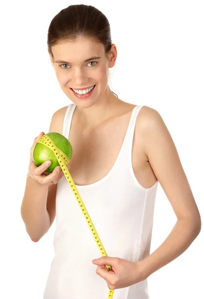 Cheerful girl with apple and tape — Stock Photo, Image