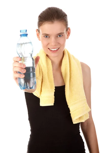 Chica sonriente después del gimnasio con botella de agua — Foto de Stock
