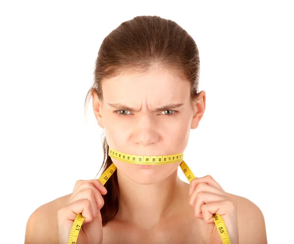 Gloomy girl on a diet with tape — Stock Photo, Image