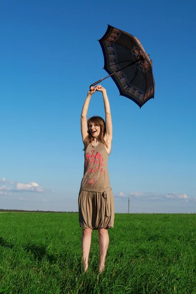 Szczęśliwa dziewczyna z parasolem — Zdjęcie stockowe