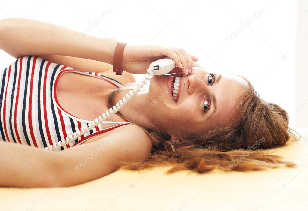 Laughing girl with phone