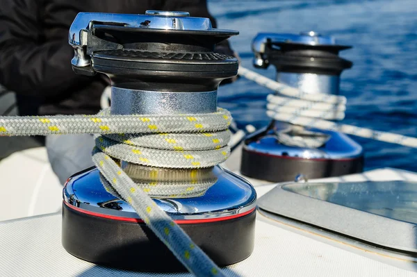 Sailing boat deck equipment: winches with mainsail and genoa sheet ropes. — Stock Photo, Image