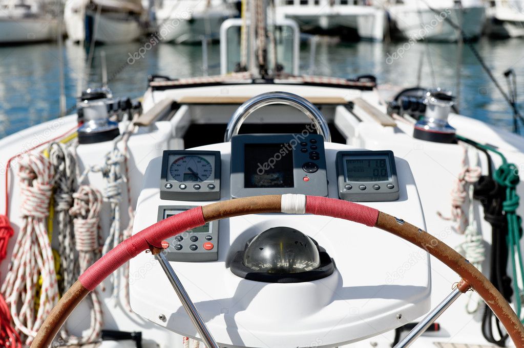 Sailing boat helm station with navigational instruments