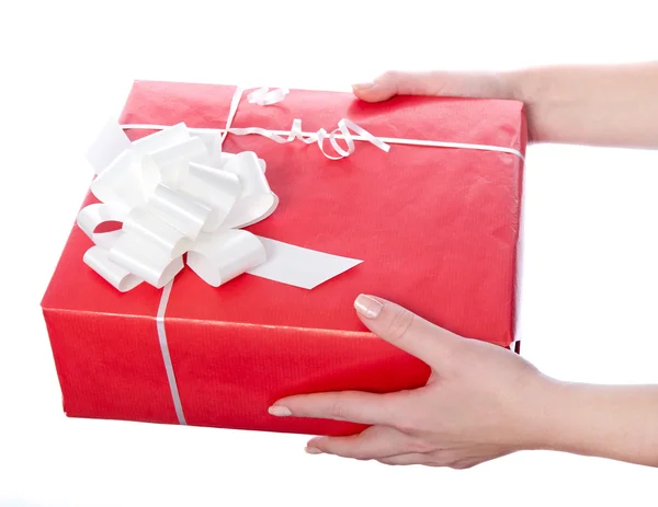 Christmas gifts in hands — Stock Photo, Image