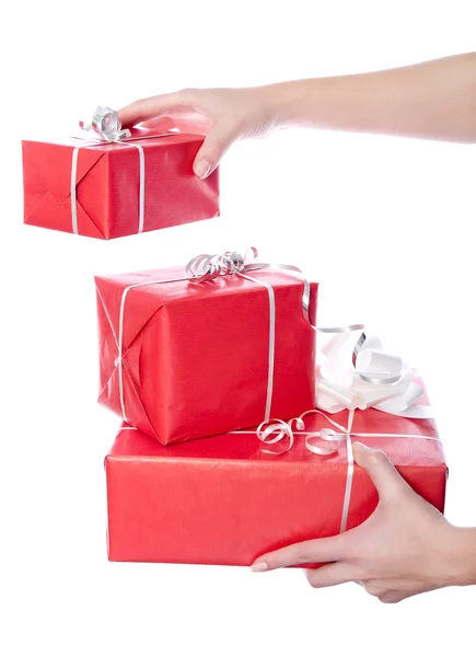 Christmas gifts in hands — Stock Photo, Image