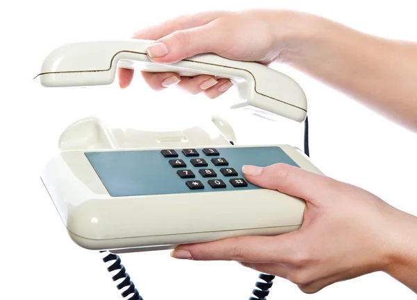 Telefone branco na mão da mulher — Fotografia de Stock
