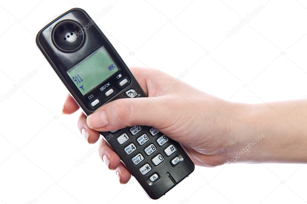 Wireless phone in woman's hand
