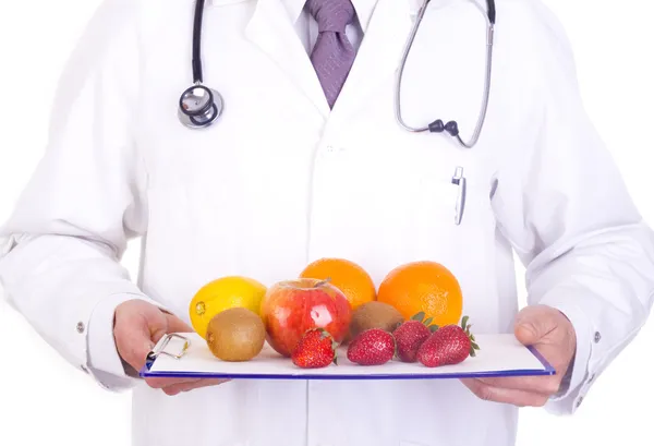 Доктор со свежими фруктами Стоковое Изображение