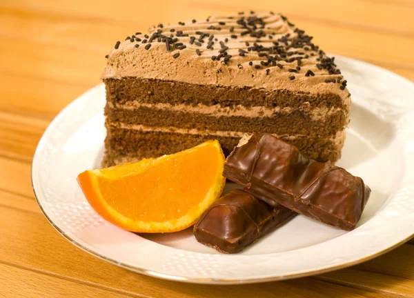 stock image Chocolate cake being sliced