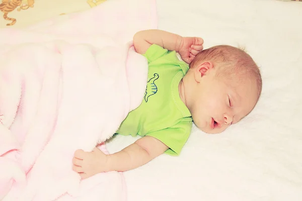 Baby sleeping in bed — Stock Photo, Image