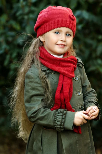 Portrait of a little girl in autumn coat — Stock Photo, Image