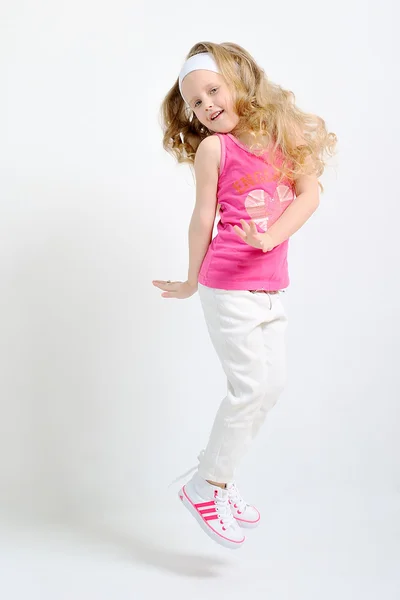 Portrait of a young girl in sportswear — Stock Photo, Image