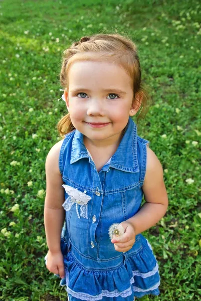 Portrait of little girl with dandelion — Stock Photo, Image