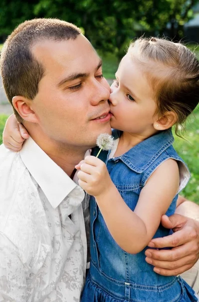 stock image Little girl kissing her father