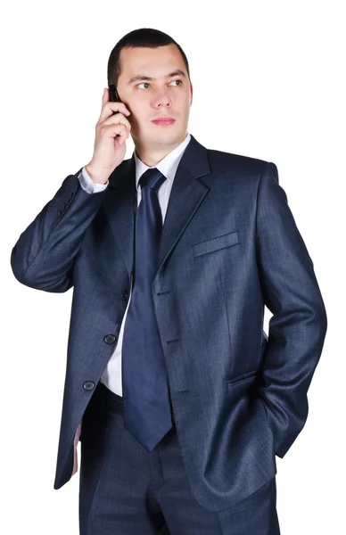Porträtt av ung affärsman tala via telefon — Stockfoto