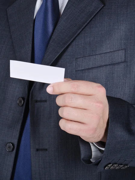 Business card in a businessman's hand — Stock Photo, Image
