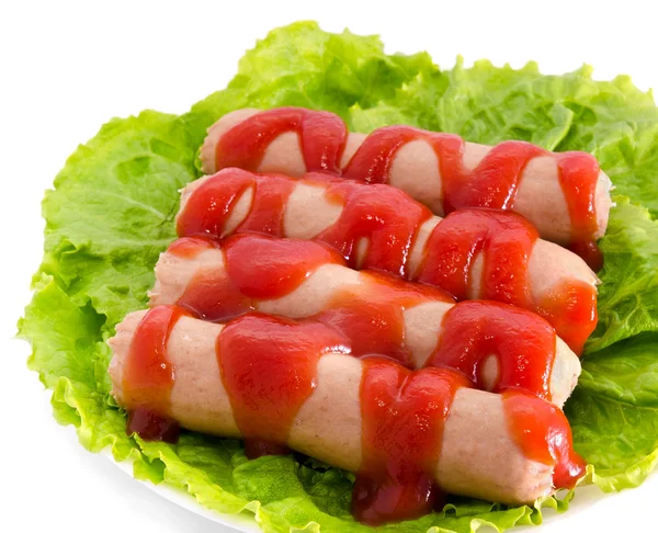 Sausages with ketchup — Stock Photo, Image
