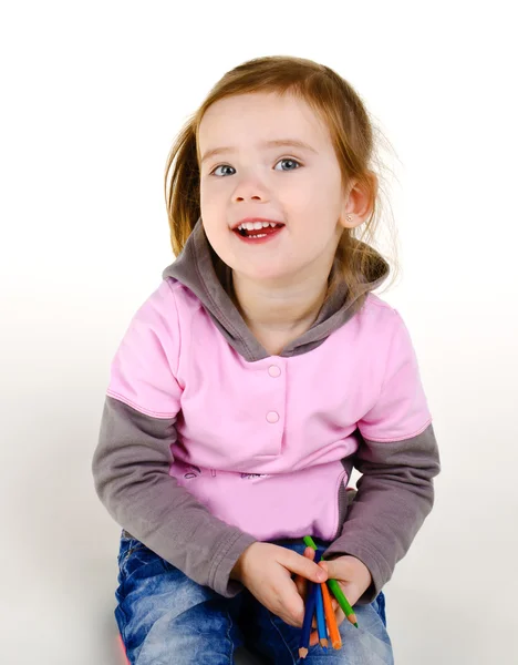 Retrato de niña sonriente con lápices — Foto de Stock