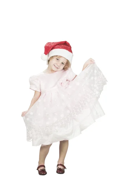 Smiling toodler girl wearing santa's hat isolated on white — Stock Photo, Image