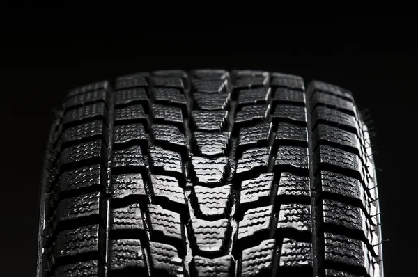 stock image Studio close up of wet winter tire tread