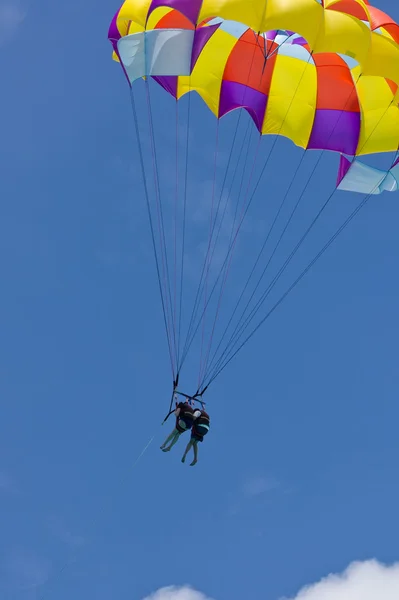 stock image Two parasailing against blue sky