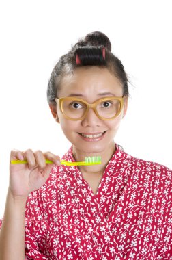 Woman Brushing Teeth clipart