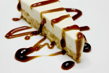 Cheesecake with caramel siryp clipart