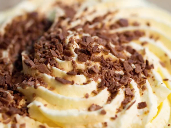 stock image Cream swirls with chocolate sprinkles