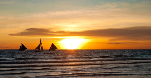 Stock image Sailing at sunset