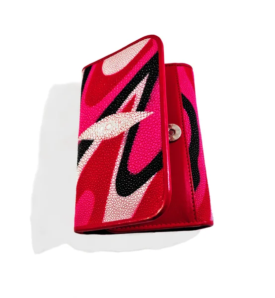stock image Pink - Women's red purse python skin. Close-up.