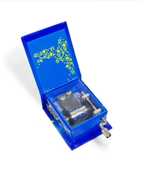 Синя музична коробка з відкритим кришкою і яскраво-жовтим візерунком. ізольовані Стокова Картинка