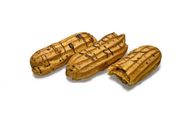 Three buns eclairs. isolated