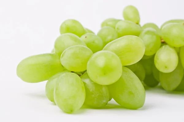 Fresh grapes closeup on bright background — Stockfoto
