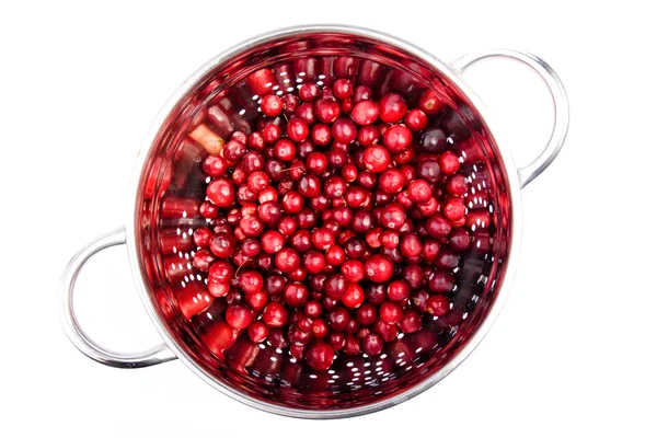 stock image Cranberry in the round colander made in studio isolated on white background