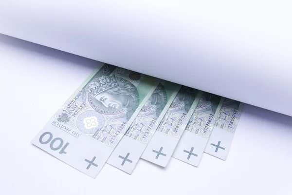 Polizh money - zloty, under white roll of paper for text or design — Stockfoto