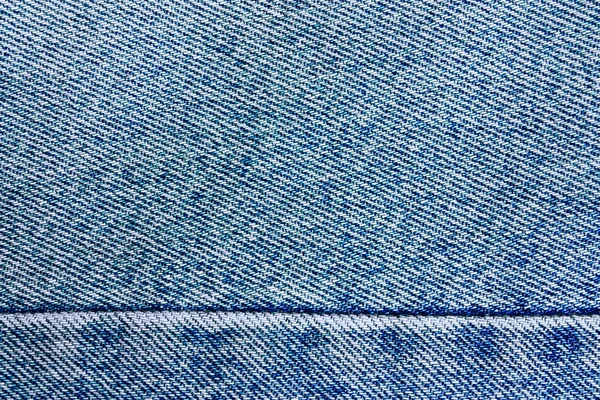 Blauwe denim jeans textuur, achtergrond om tekst of ontwerp te voegen gedragen — Stockfoto