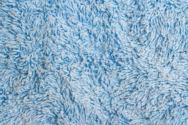Peloso modello tappeto blu come sfondo — Foto Stock