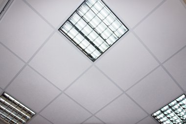 Fluorescent lamp on the modern ceiling, architexture detail clipart