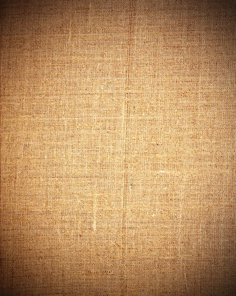 Aged brown fabric as grunge background for insert text or design — Stock Photo, Image