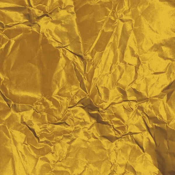 Zlatá zmačkaný papír — Stock fotografie