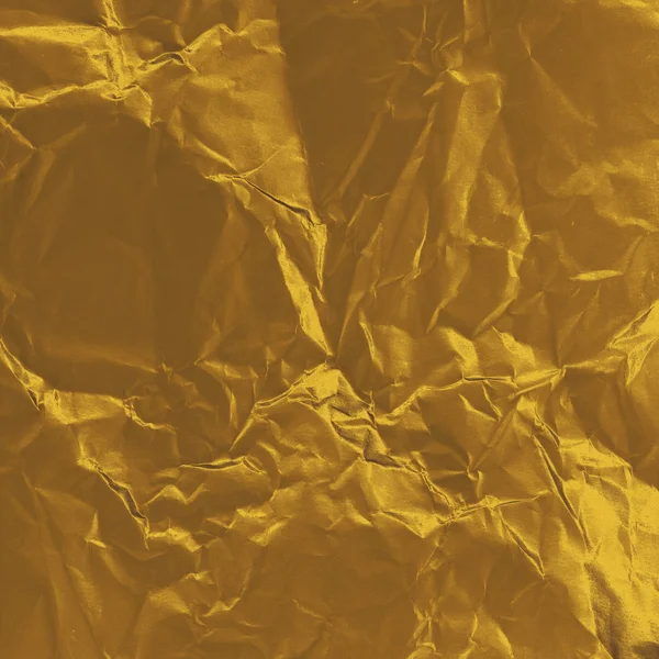 Crumpled gold paper — Stock Photo, Image