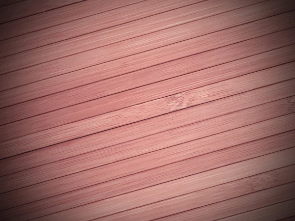 Rosa bakgrund av diagonal ribbor. — Stockfoto