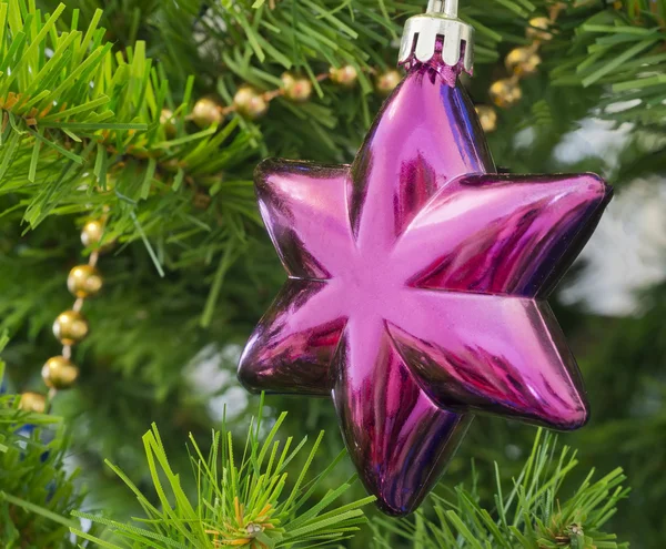 The Christmas-tree decoration in the form of six-final purpur st — Stock Photo, Image