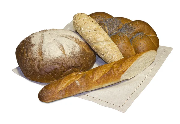 Black round bread, rich wattled roll and two baguettes on the l — Stock Photo, Image