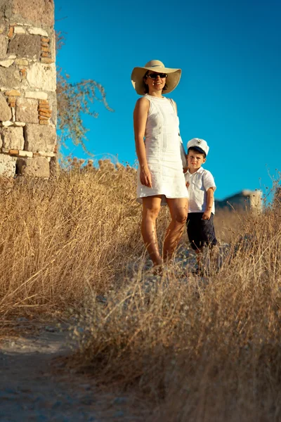 Mother and her cute little son walking outdoors — Stock Photo, Image