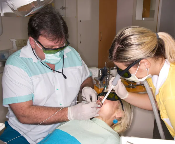 Dental team och patienten — Stockfoto